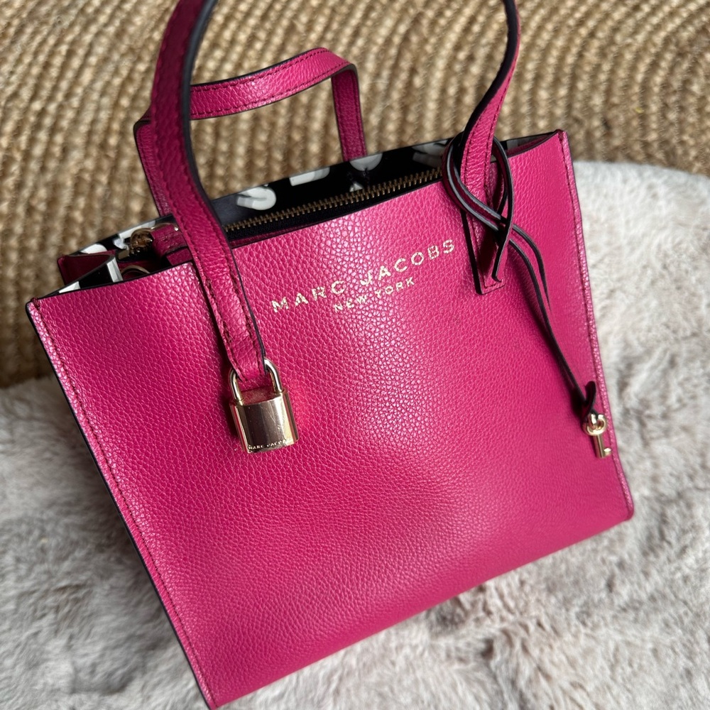 SOLD!!

MARC JACOBS Pink Leather Mini Tote w Crossbody Strap Orig. $256 Now $120